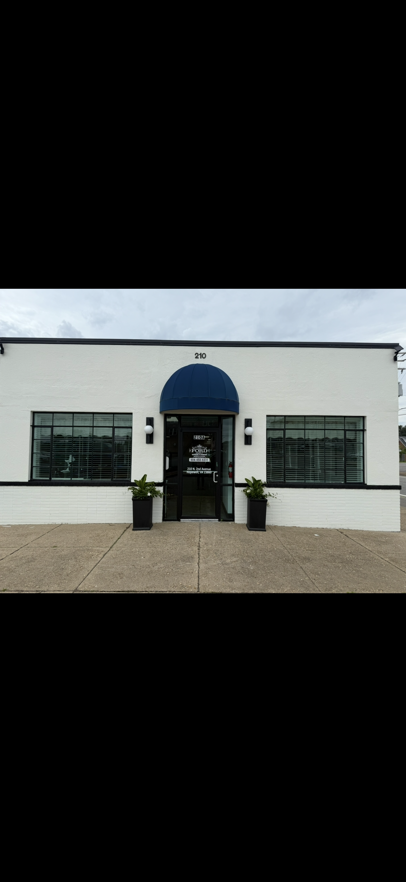 Exterior of the Ford Agency office at 210 North 2nd Avenue